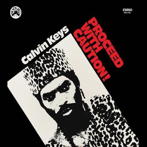 Calvin Keys - Proceed With Caution! - Import Orange & Black Streaks Vinyl LP Record
